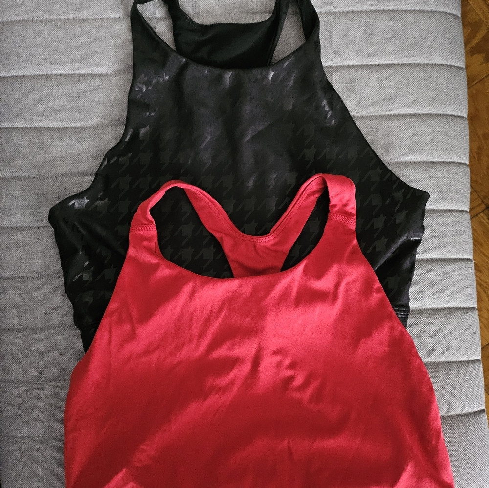 Set of Red + Black Peloton and Girlfriend Collective Sports Bras.